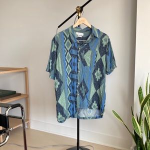 Urban outfitters allover art print Hawaiian shirt.